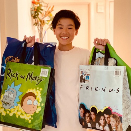 Aston Droomer carrying his shopping bag.